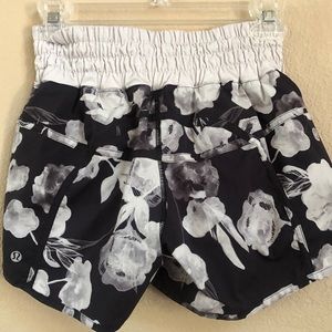 Lululemon 4 way tracker shorts.
